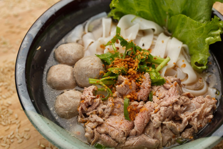 Duo of beef: sliced tenderloin and beef ball over small rice noodle