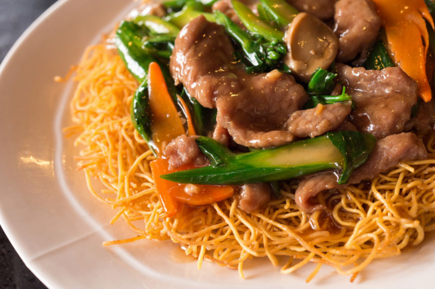 Hong Kong style chow mein over crispy egg noodle