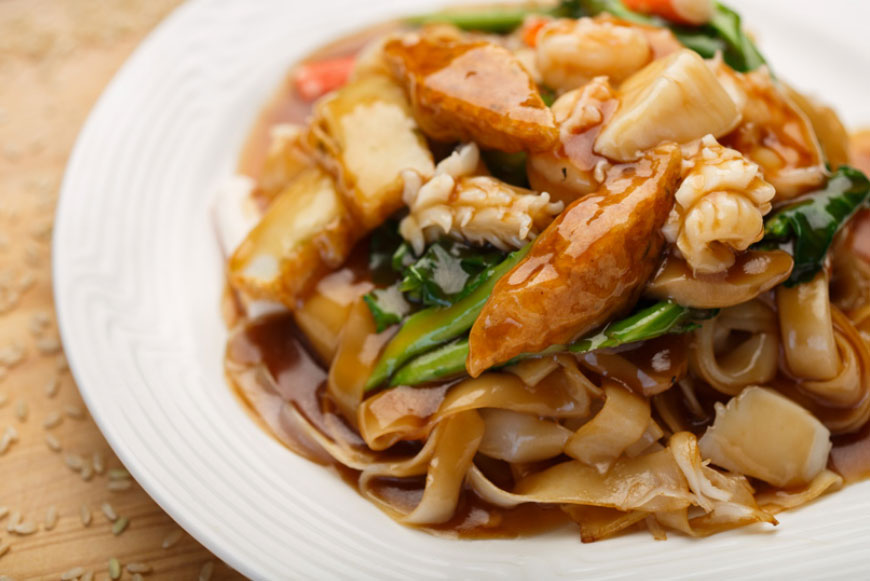 Hong Kong style chow fun with Chinese broccoli, mushroom and gravy